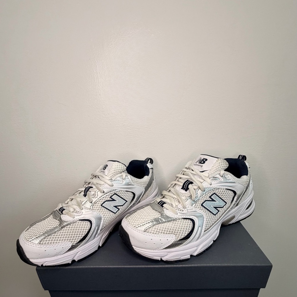 New Balance men's White and Black Sneakers